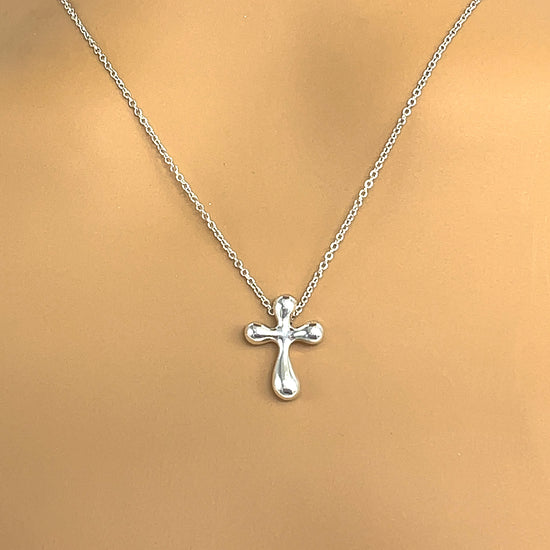 Elsa Peretti® cross pendant in platinum with diamonds, 17 mm wide. | Tiffany  & Co.