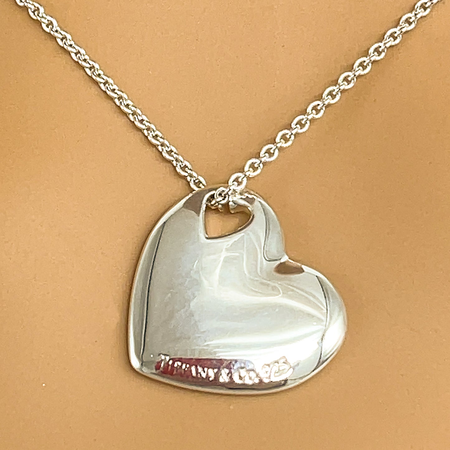 Load image into Gallery viewer, Preowned Tiffany and Co. Sterling Silver Cutout Heart Pendant Necklace
