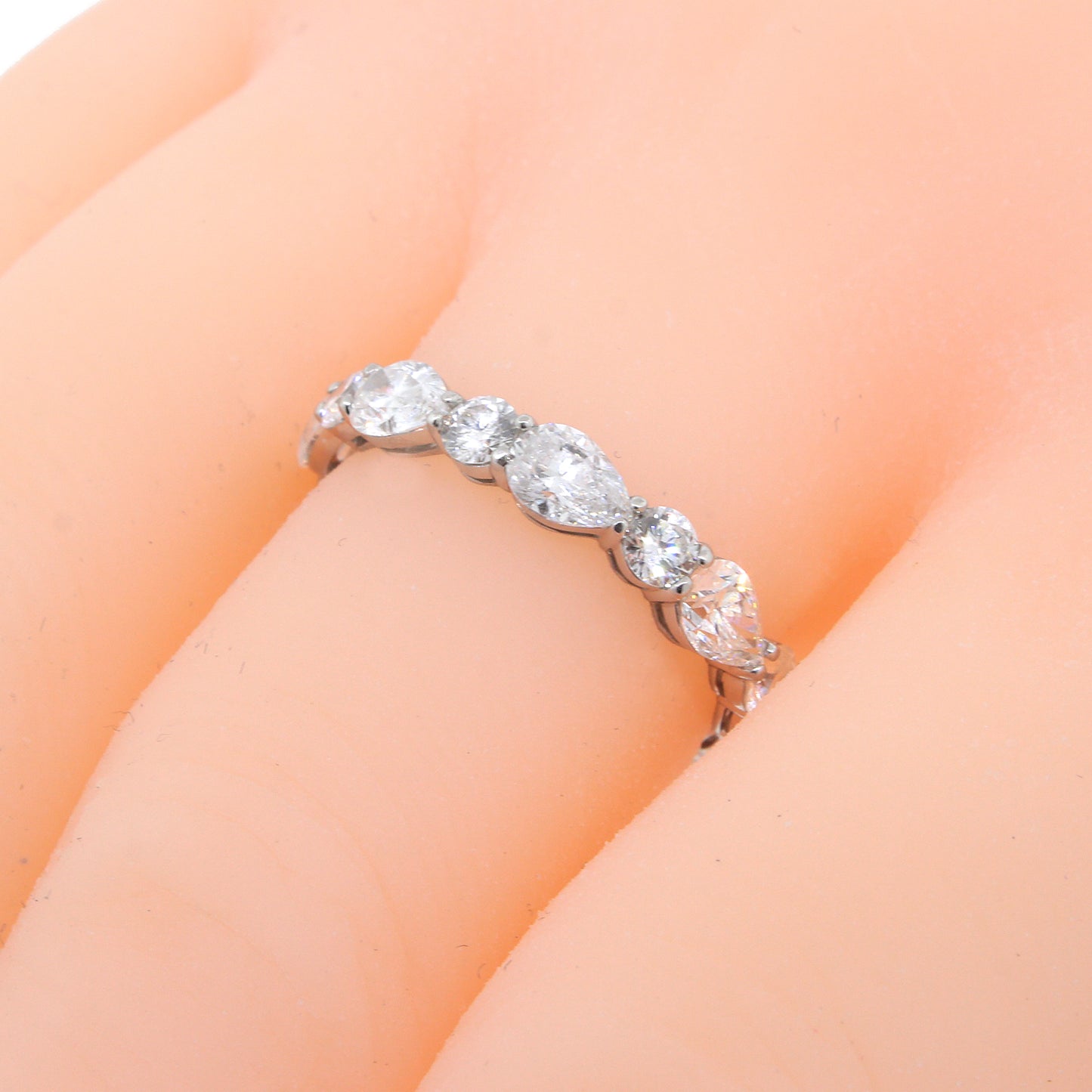 Load image into Gallery viewer, Platinum Pear Shaped and Round Diamond Wedding Band
