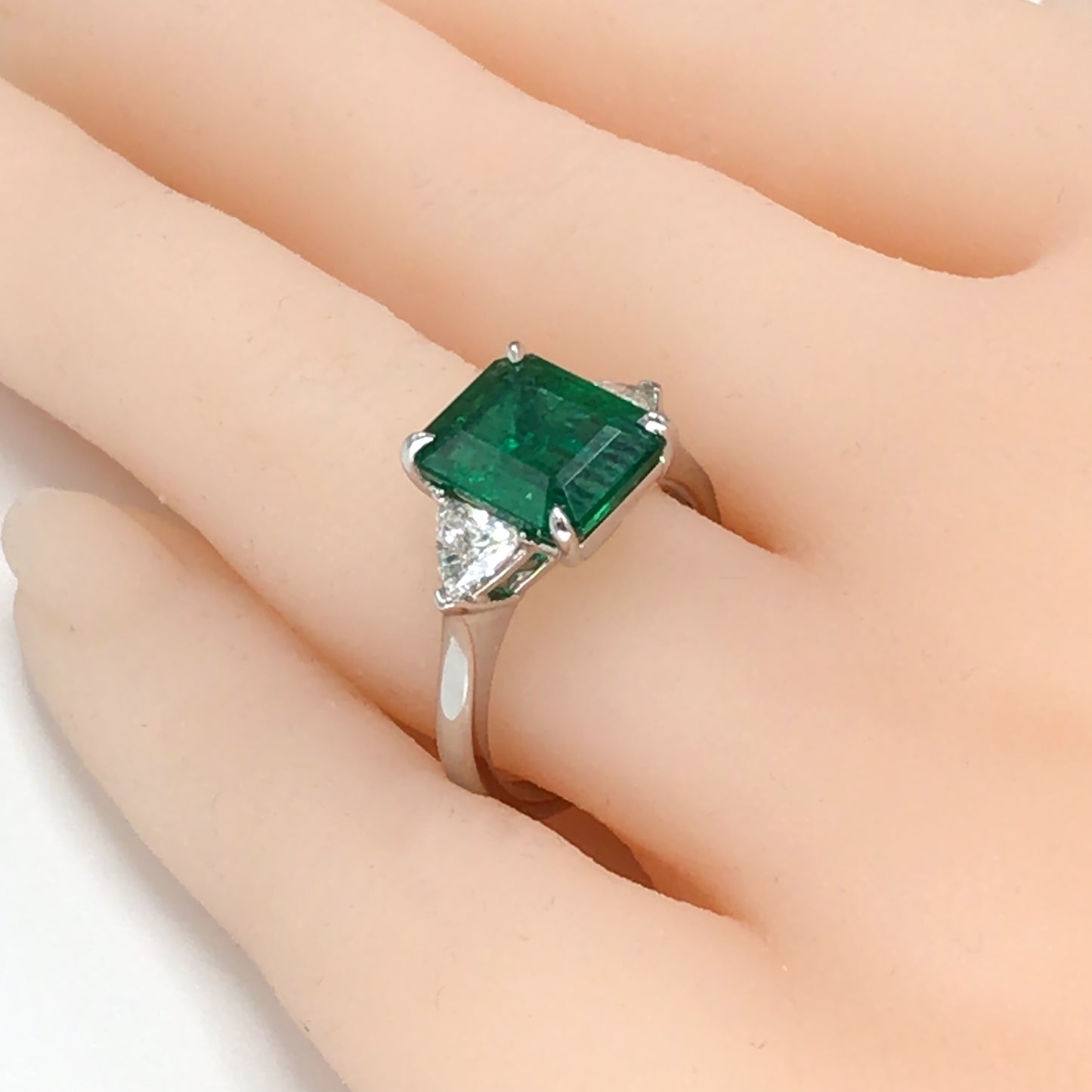 18k White Gold Emerald and 2 Trillion Diamond Ring