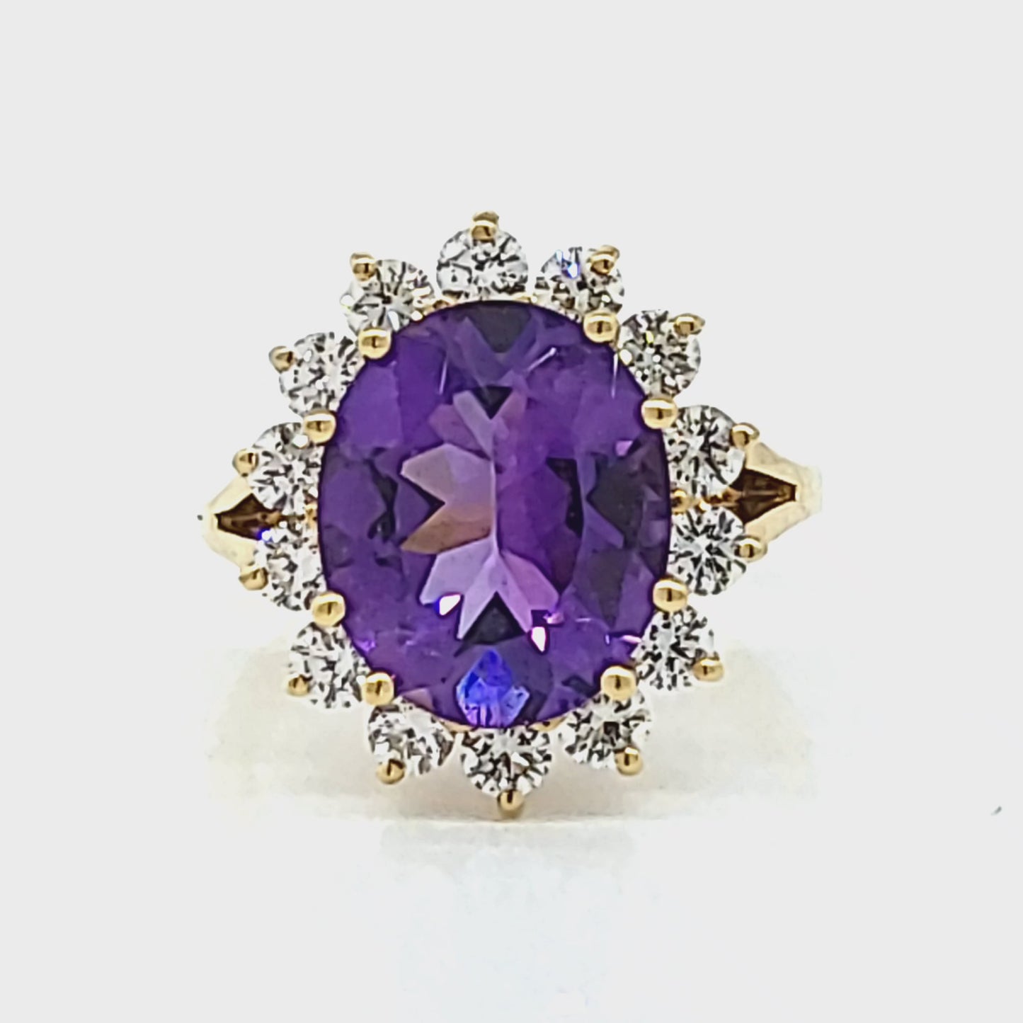 Load and play video in Gallery viewer, Oval Amethyst and Diamond Cluster Ring Size 6
