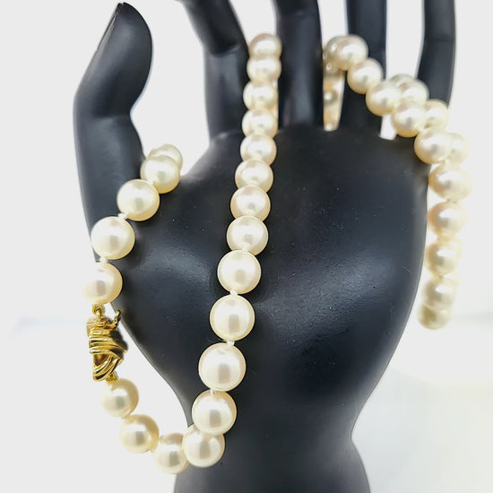 Load and play video in Gallery viewer, Tiffany and Co. Akoya Pearls with 18k Yellow Gold X Clasp Necklace
