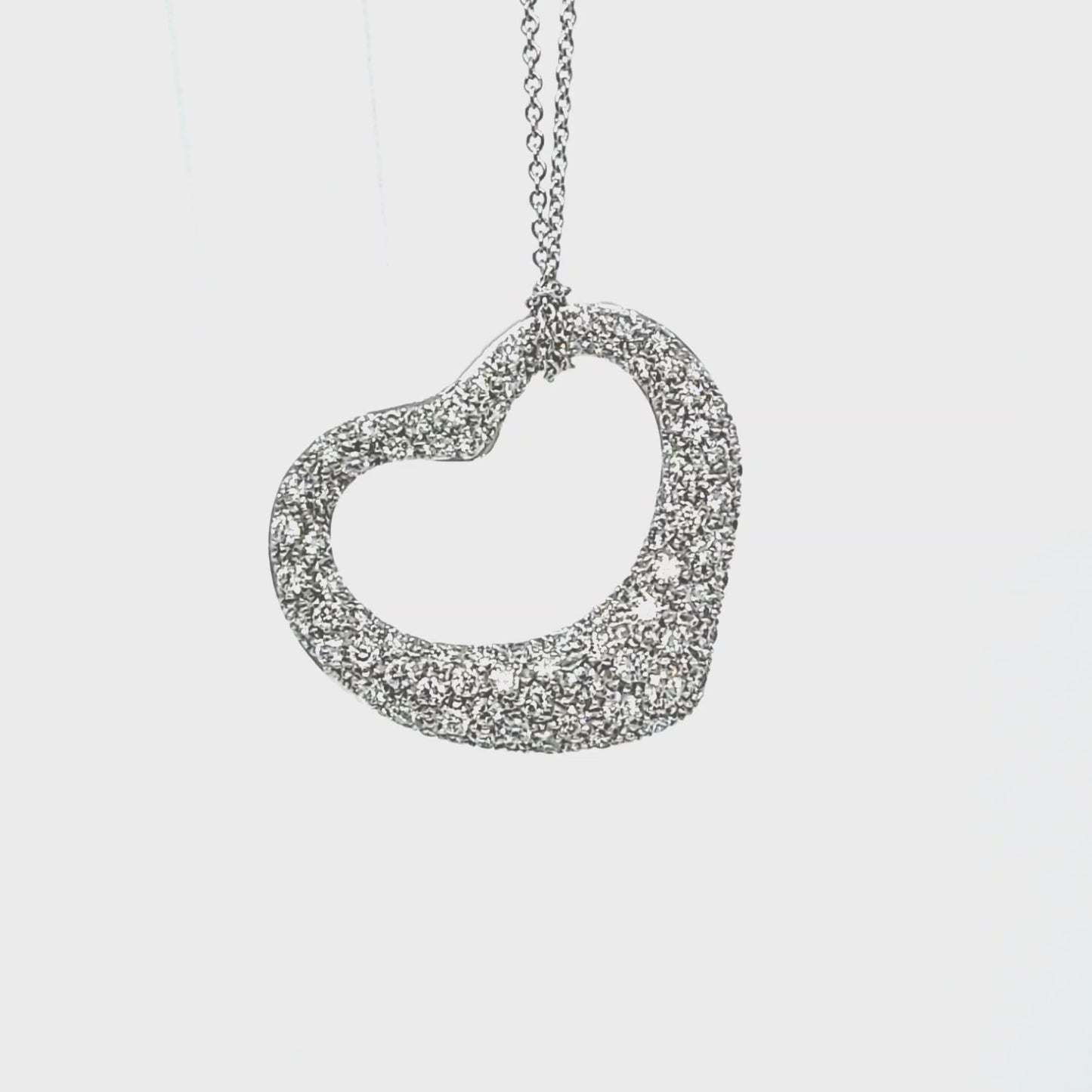 Elsa Peretti® Open Heart pendant in sterling silver with diamonds. | Tiffany  & Co.