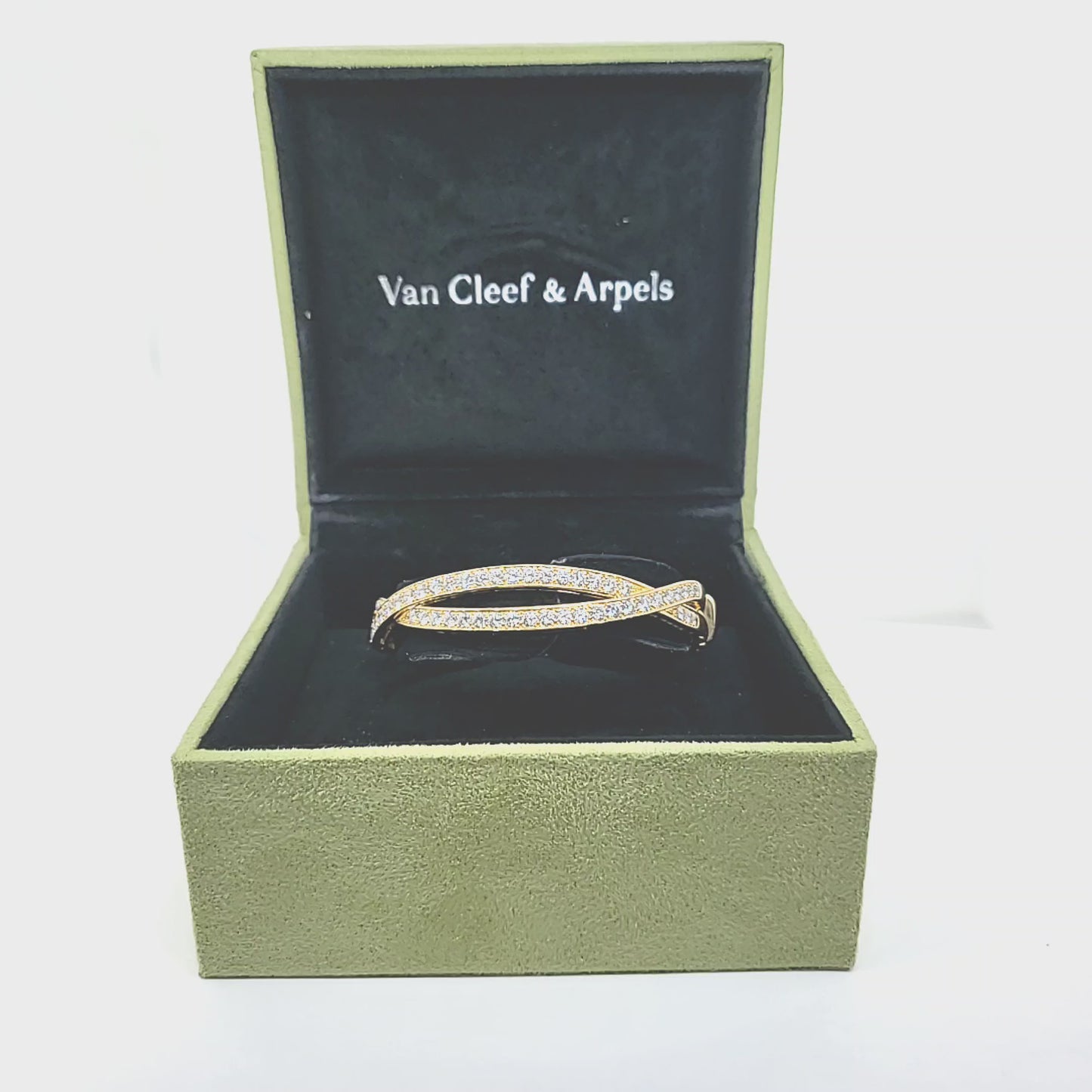 Load and play video in Gallery viewer, Pre-Owned Van Cleef &amp;amp; Arpels Diamond Bangle Crossover Bracelet
